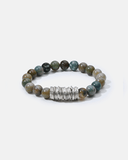 Beaded bracelet with a silver clasp on a white background