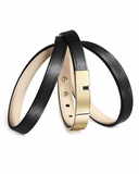 Black leather wrap bracelet with gold clasp on a white background