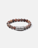 Bracelet with brown beads and a silver clasp on a white background