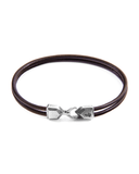 Brown leather bracelet with silver clasp on a white background