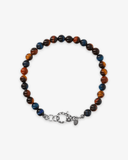 Multicolored beaded bracelet with a silver clasp on a white background