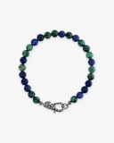 Beaded bracelet with blue and green stones on a white background