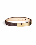 Brown python leather bracelet with matte gold clasp on a white background
