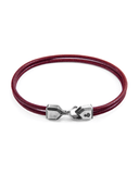 Red leather bracelet with silver clasp on a white background