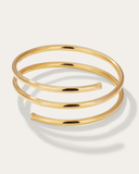 Gold bangle on a white background