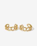 Gold chain-style ear cuffs on a white background