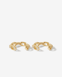 Gold chain-style ear cuffs with clear stones on a white background