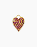 Heart-shaped charm with pink stones and gold border on a white background