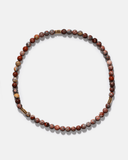 Necklace with multicolored beads on a white background