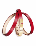 Red leather wrap bracelet with gold clasp on a white background