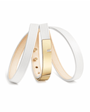 White leather wrap bracelet with gold clasp on a white background